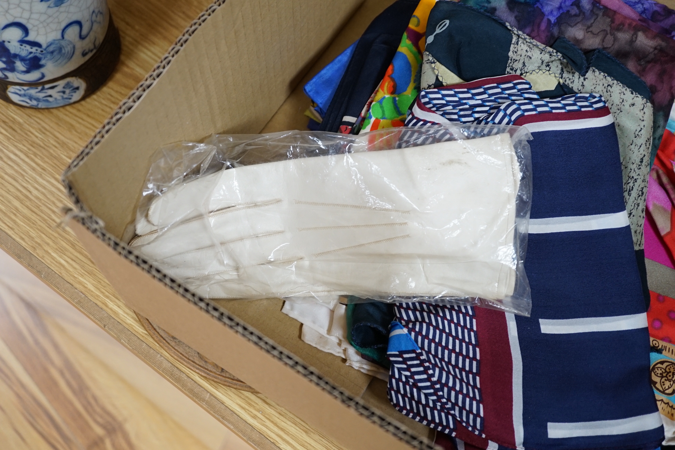 A group of silk and other scarves, kid gloves and three velvet ladies hats